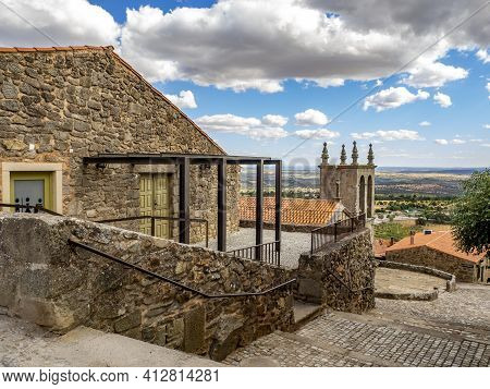 Castelo Rodrigo, Portugal - August  2020: View Of The Cobble Street Leading To The Clock Tower And T