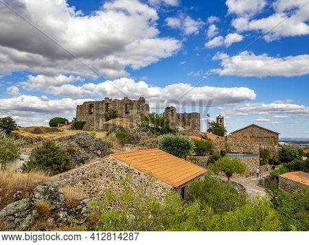 Castelo Rodrigo, Portugal - August  2020: View Of The Cobble Street Leading To The Clock Tower And T