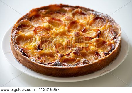 Fresh Baked French Pie With Ripe Plums