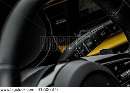 Car Rain Windscreen Wiper Control Switch In Car Close Up View On The Steering Wheel. Wipers Switch C