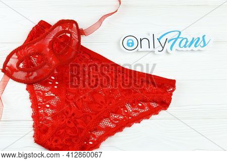 Kharkov, Ukraine - February 14, 2021: Onlyfans Paper Logo And Red Lingerie. Onlyfans Is Content Subs
