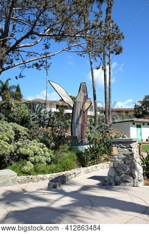 LAGUNA BEACH, CALIFORNIA - OCTOBER 3, 2016: Heisler Park Whale Sculpture. Stretching along the bluffs this oceanfront park has walking trails, gardens, a marine refuge, picnic tables and barbeques.