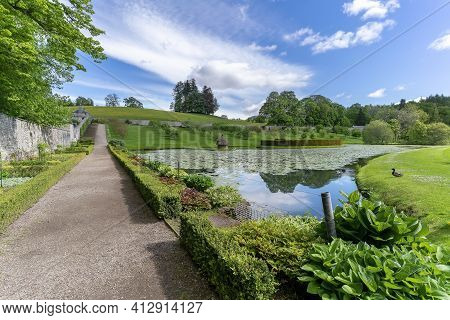 Perthshire, Scotland - May 24 , 2019 : Garden And Pond In White Elegant Blair Castle Locates Near Th