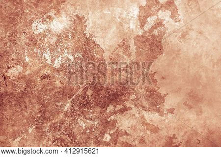 Textured Rust Stucco Background With Scratches, Scuffs And Stains. Plaster Backdrop Of Ginger Color 
