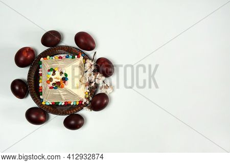 Easter Composition. Eggs, Apricot Flowers And Orthodox Easter Curd Dessert In The Form Of A Pyramid 