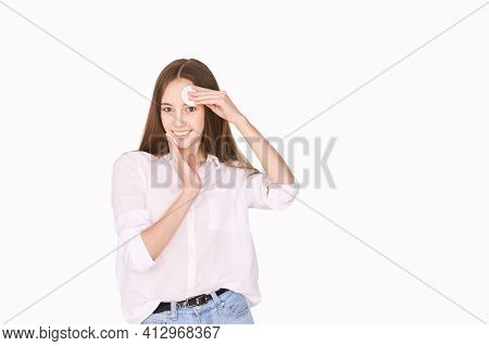 Pretty Girl Indoor Portrait. Light Background. Female Teenager Person. Long Brow Hair. Cleansing Dir