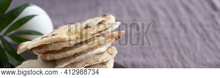 Homemade Matzo  With Microgreen Peas. Unleavened Flatbread Bread. Pesah Celebration Concept.  Jewish