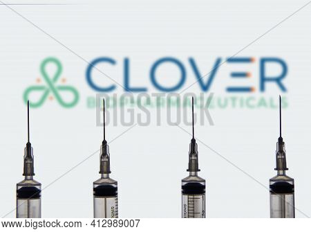 Kathmandu, Nepal - March 17 2021: Four Syringe Or Injection Needles Against Clover Biopharmaceutical