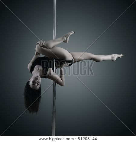 pole dancer, young woman dancing on pylon, toned and noise added