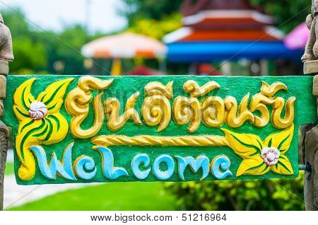 Thai and English in welcome