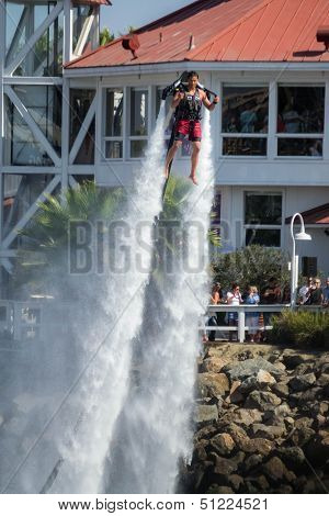 Unidentfied man demonstrates flyboard acrobatics in Long Beach