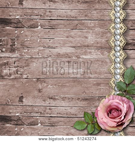 Old Wooden Background With A Rose, Paper Flowers, Pearls