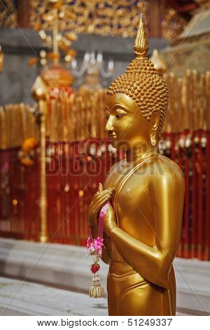 Standing Buddha statue in Wat Phra That Doi Suthep, Chiang Mai, Thailand