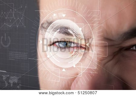 Modern cyber man with technolgy eye looking