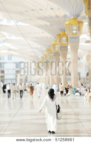 Muslim Arabic woman portrait outdoors in holy mosque
