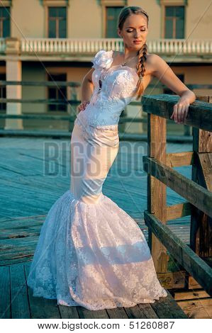 Beautiful Blonde Haired Woman In Bridal Dress