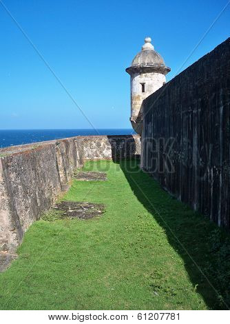 Between the outer walls of Castillo de San Cristobal
