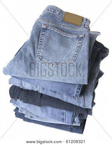 Stack of blue jeans on white background