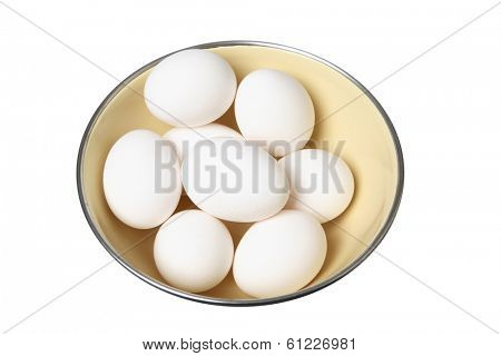 eggs in beige bowl on white background 