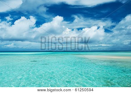 Beautiful island beach with sandspit at Maldives