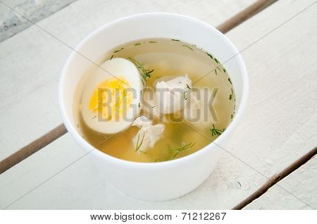 Chicken Soup With Noodles And Boiled Eggs