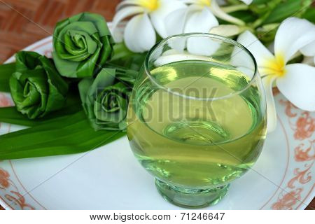 A Bowl Of Pandan Juice And Pandan Leave