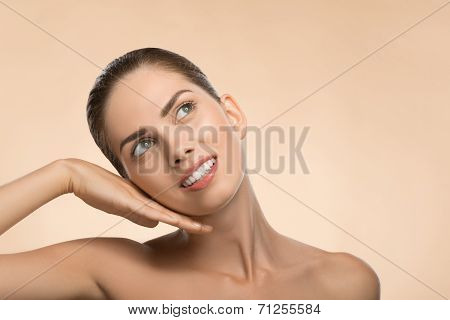 Portrait of girl holding hands near her face with clean and  fre