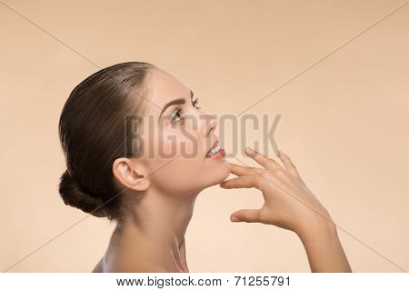 Portrait of girl holding hands near her face with clean and  fre