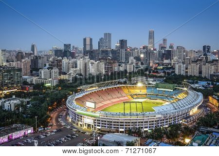 Beijing, China skyline and stadium.
