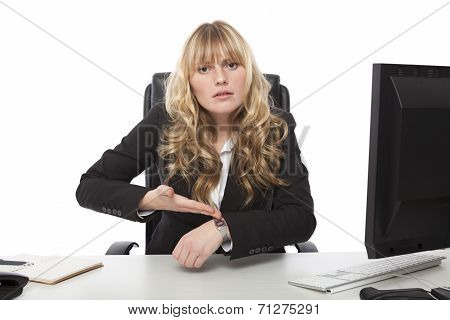 Businesswoman Pointing At Her Wrist Watch