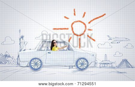 Young woman riding car made of list of paper