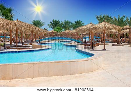 HURGHADA, EGYPT - APR 29, 2012: tropical swimming pool at Hilton Long Beach Resort Hotel in Hurghada