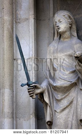 VIENNA, AUSTRIA - OCTOBER 11: Saint Justine of Padua, portal of the Minoriten kirche in Vienna, Austria on October 11, 2014.