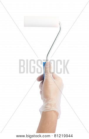 Hand holding a new paint roller