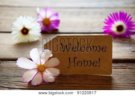 Label With Text Welcome Home With Cosmea Blossoms