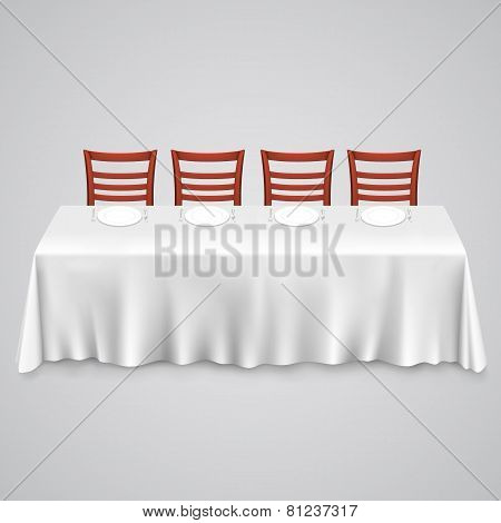 Table with a tablecloth and chair