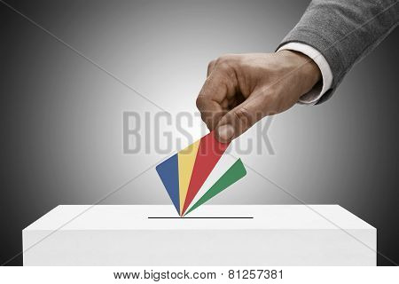 Black Male Holding Flag. Voting Concept - Republic Of Seychelles