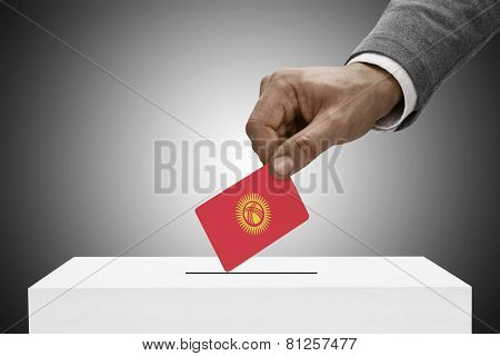 Black Male Holding Flag. Voting Concept - Kyrgyzstan