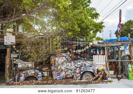 KEY WEST, FL - DECEMBER 29: Old truck covered with bumper stickers at Bo's Fish Wagon restaurant in Key West, Florida in 2014