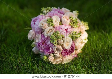 Bride's Bouquet on Green Grass