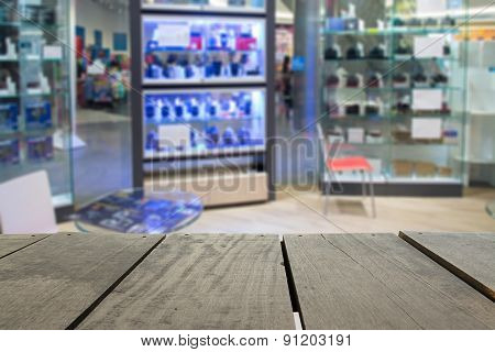 Defocus And Blur Image Of Terrace Wood And Camera Shop For Backg