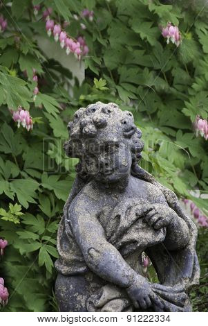 Statue In Bleeding Hearts