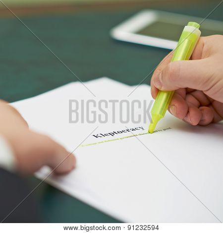 Marking words in a kleptocracy definition
