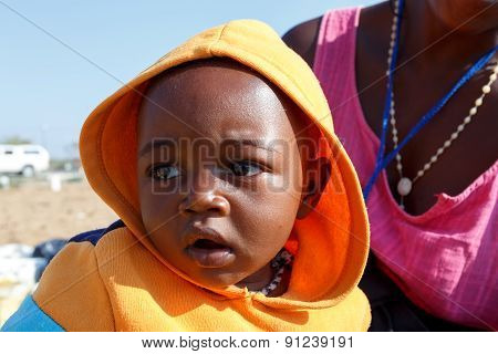 Portrait Of Namibian Small Boy With Mother