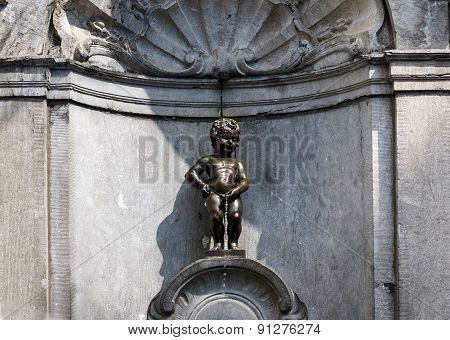 Manneken Pis (little Man Pee), A Small Bronze Sculpture In Brussels