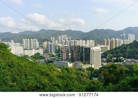 HONG KONG - APRIL 17, 2015: view on Sha Tin from the hill. Sha Tin, also spelt Shatin, is an area around the Shing Mun River in the New Territories of Hong Kong. Administratively,