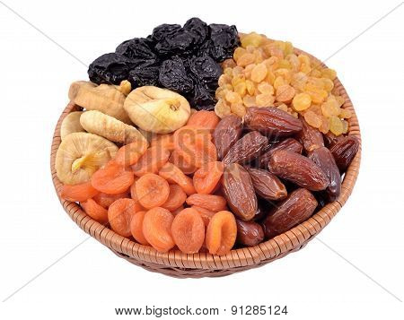 Various Dried Fruits In Wicker Bowl
