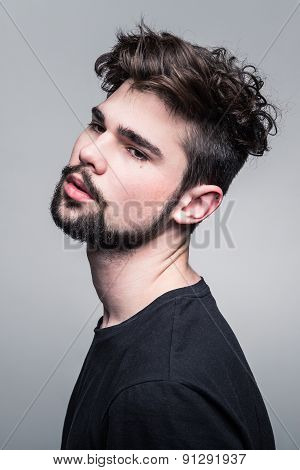 Professional studio portrait of young handsome man