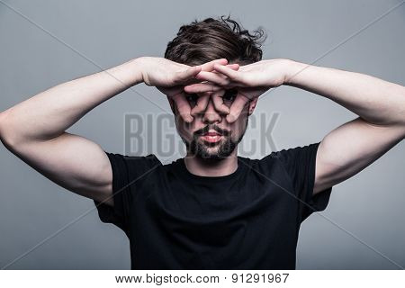 Professional studio portrait of young handsome man