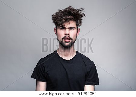 Professional studio portrait of young handsome man
